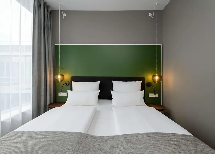 Flightgate Munich Airport Hotel, A Member Of Radisson Individuals מלון הלברגמוס