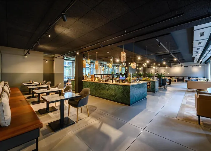 Flightgate Munich Airport Hotel, A Member Of Radisson Individuals מלון הלברגמוס