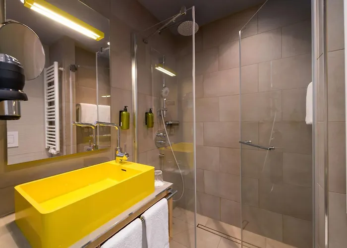 Flightgate Munich Airport Hotel, A Member Of Radisson Individuals מלון 3*