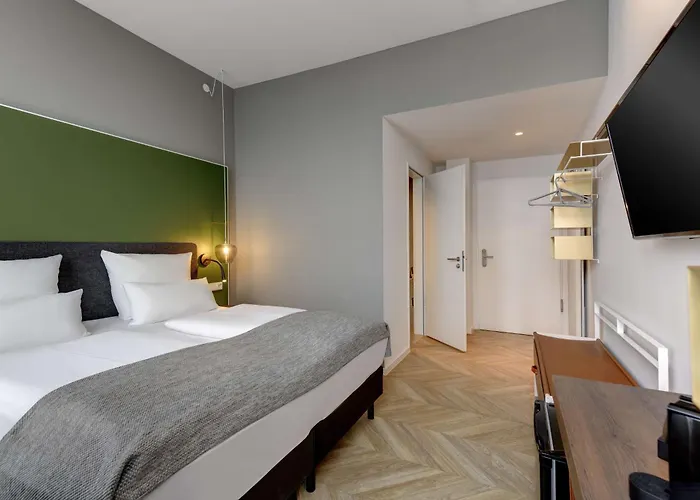 מלון Flightgate Munich Airport Hotel, A Member Of Radisson Individuals 3*