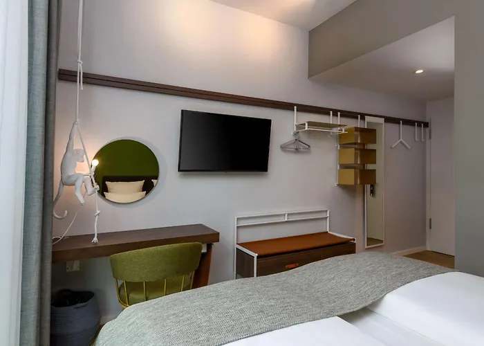 Flightgate Munich Airport Hotel, A Member Of Radisson Individuals מלון הלברגמוס